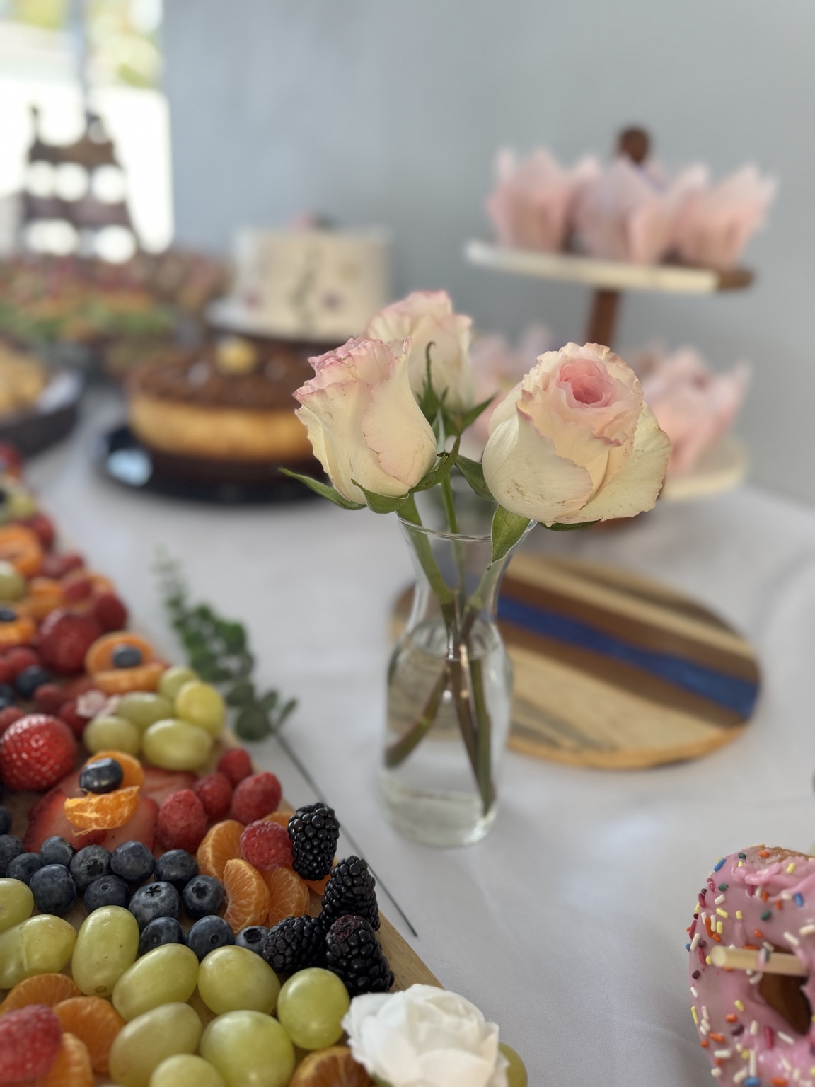 Fruit and charcuterie display with roses